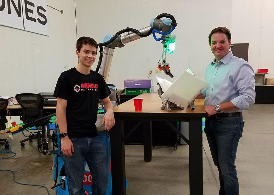 Mick Arnold and Steven Appel with Robot